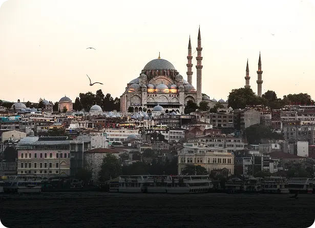 Süleymaniye Mosque dominating the Istanbul skyline viewed from the Bosphorus at dusk